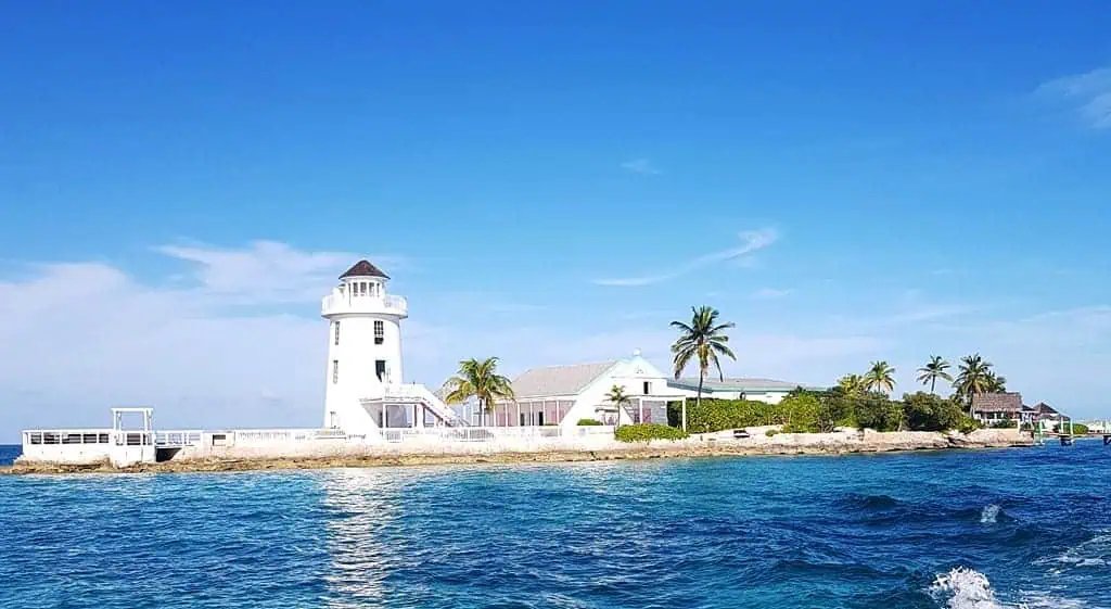 Blue Lagoon vs Pearl Island comparison – white lighthouse on Pearl Island, Bahamas
