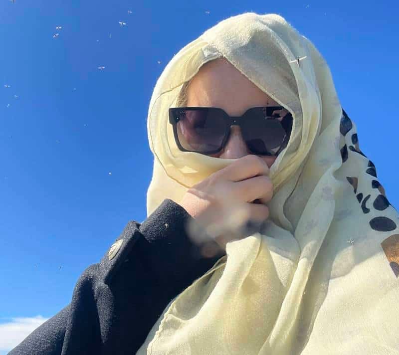 Lake Myvatn - flies - the photo of me with scarf chasing flies away